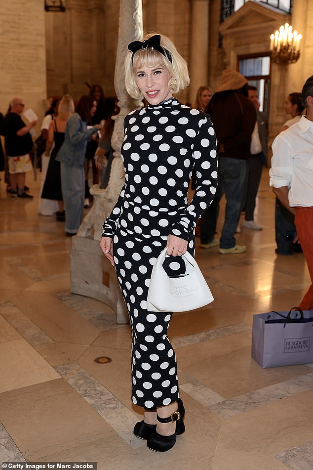 English singer Natasha Bedingfield, 42, also opted for polka dots with white circles on a long black dress