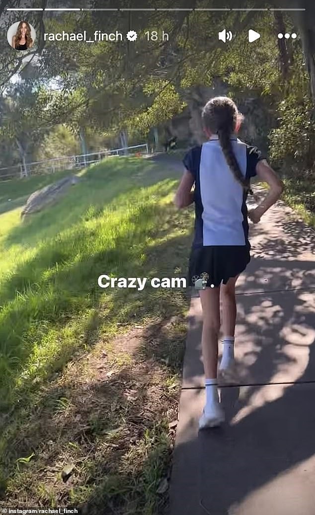 It comes after Rachael caused controversy when she uploaded a video of herself jogging behind Violet while screaming words of encouragement as she competed against her peers. (Pictured: A screenshot from Rachael's controversial video of Violet's race)