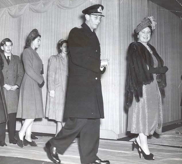 Princess Elizabeth walks next to her sister Margaret behind their parents George VI and Queen Elizabeth as they leave Westminster Abbey following the her final wedding rehearsal