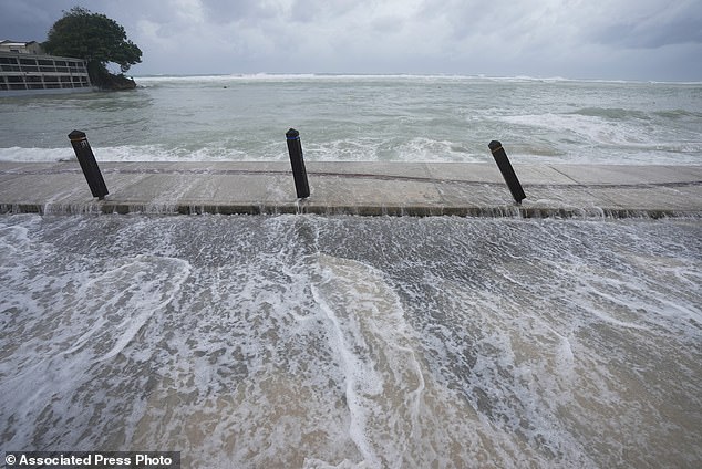 The sea floods the street after Hurricane Beryl passed through St. Lawrence, Barbados on July 1, 2024