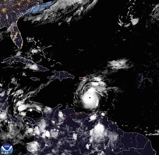This National Oceanic and Atmospheric Administration satellite image taken at 10.50pm EDT shows hurricane Beryl, center, as it moves across the Caribbean on Monday, July 1, 2024. Hurricane Beryl strengthened to Category 5 status as it crossed islands in the southeastern Caribbean