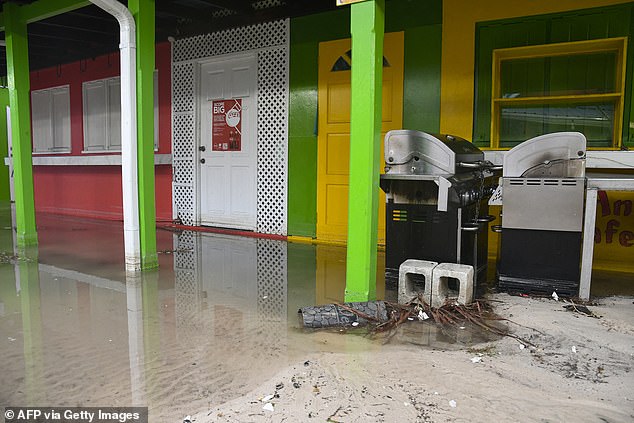 Flooded shops fronts are seen after the passage of Hurricane Beryl in Oistins gardens, Christ Church, Barbados on July 1, 2024.