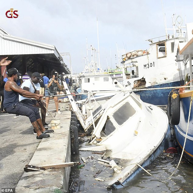 Damaged boats on Tuesday, July 2 after Hurricane Beryl made landfall with devastating winds and storm surge, in Bridgetown port, Barbados on Monday