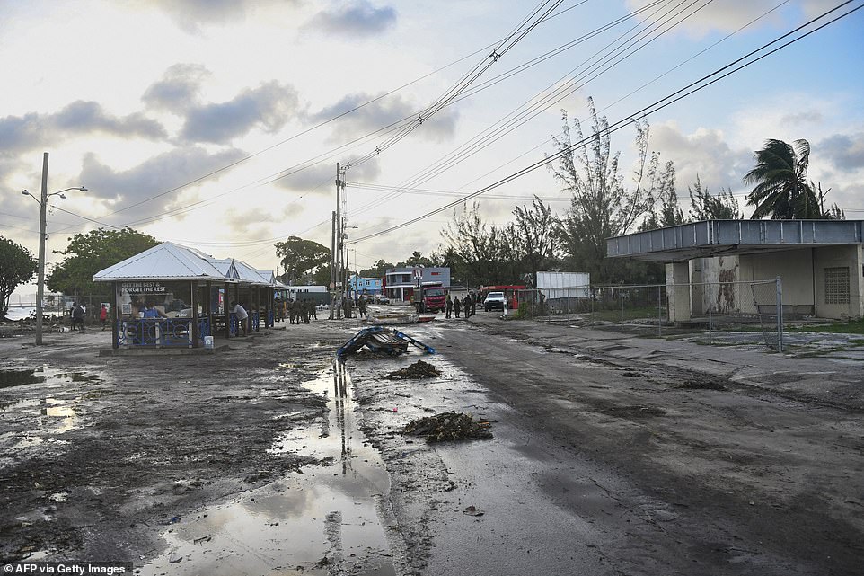 Grenada's Prime Minister Dickon Mitchell said one person had died and he could not yet say if there were other fatalities because authorities had not been able to assess the situation on the islands of Carriacou and Petite Martinique, where there were initial reports of major damage but communications were largely down. 'We do hope there aren't any other fatalities or any injuries,' he said. 'But bear in mind the challenge we have in Carriacou and Petite Martinique.' Mitchell added that the government will send people first thing on Tuesday morning to evaluate the situation on the islands. Mitchell said he would travel to Carriacou as soon as it's safe, noting there has been an 'extensive' storm surge. Grenada officials had to evacuate patients to a lower floor after hospital roof was damaged, he said. 'There is the likelihood of even greater damage,' he told reporters. 'We have no choice but to continue to pray.'