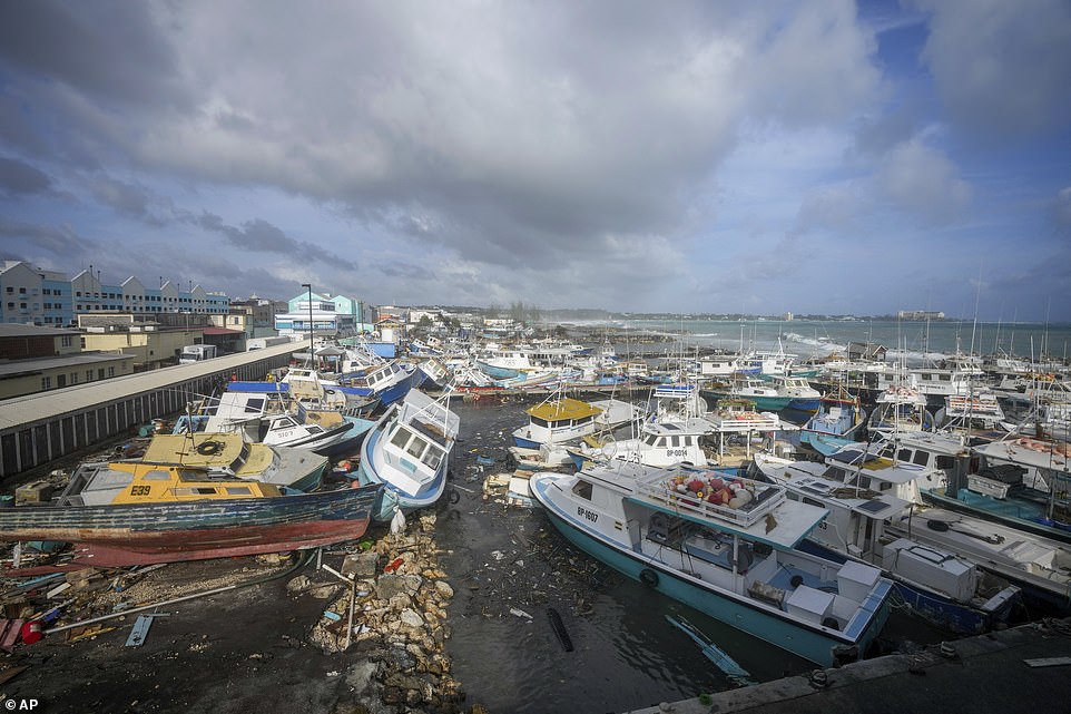 In Barbados, Wilfred Abrahams, minister of home affairs and information, said drones ¿ which are faster than crews fanning across the island ¿ would assess damage once Beryl passed. Jaswinderpal Parmar of Fresno, California, who was among the thousands who travelled to Barbados for Saturday's Twenty20 World Cup cricket final, said he and his family were now stuck there with scores of other fans after their flights cancelled on Sunday. He said by phone that it is the first time he has experienced a hurricane ¿ he and his family have been praying, as well as taking calls from concerned friends and family as far away as India. 'We couldn't sleep last night,' Parmar said. The last strong hurricane to hit the southeast Caribbean was Hurricane Ivan 20 years ago, which killed dozens of people in Grenada.