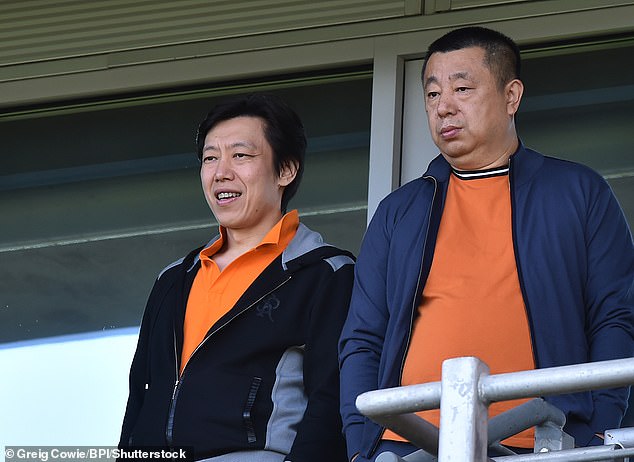 Reading owner Dai Yongge (right) withdrew the club's women's team from the Championship