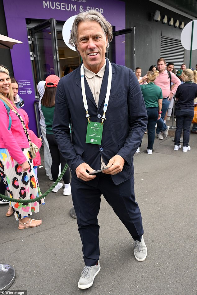 John Bishop also attended as he donned a navy jacket and matching trousers over a beige shirt