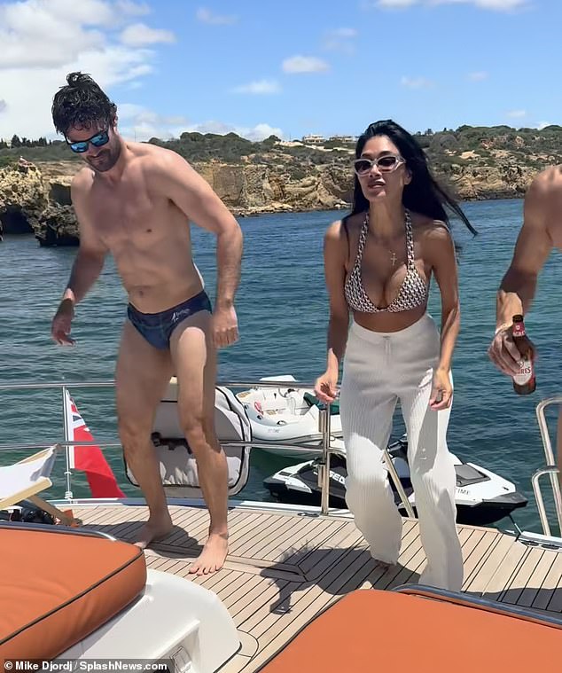 The Pussycat Dolls singer is enjoying a holiday in the sun alongside her partner, his brother Max and some other friends for her 46th birthday which was on Saturday