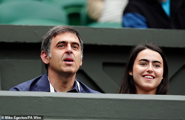 Ronnie O'Sullivan was spotted with his daughter Lily as the pair watched from the stands at the All England Lawn Tennis and Croquet Club