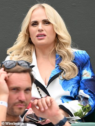The Pitch Perfect star looked pensive as she watched the action play out on Centre Court
