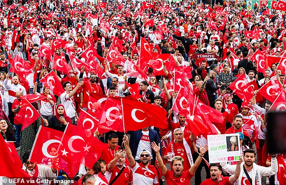 LEIPZIG, GERMANY - JULY 2: Fans of the Turkiye football team at the city center prior the round of 16 match between Austria and Turkiye on July 02, 2024 in Leipzig, Germany. (Photo by Jens Schlueter - UEFA/UEFA via Getty Images)