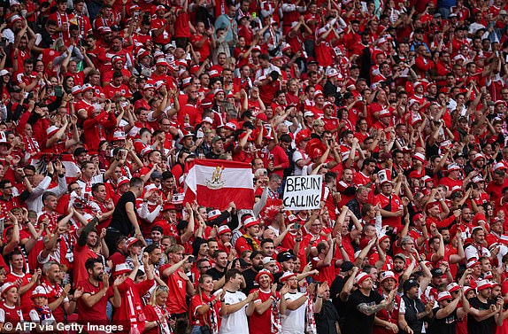 Supporters of Austria cheer before the start of the UEFA Euro 2024 round of 16 football match between Austria and Turkey at the Leipzig Stadium in Leipzig on July 2, 2024. (Photo by Adrian DENNIS / AFP) (Photo by ADRIAN DENNIS/AFP via Getty Images)