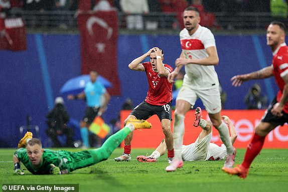 LEIPZIG, GERMANY - JULY 02: Christoph Baumgartner of Austria reacts after Mert Gunok of Turkiye saves his last minute headed shot during the UEFA EURO 2024 round of 16 match between Austria and Turkiye at Football Stadium Leipzig on July 02, 2024 in Leipzig, Germany. (Photo by Boris Streubel - UEFA/UEFA via Getty Images)