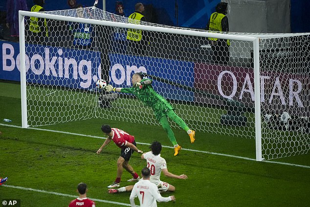 Mert Gunok produced this sensational save to deny Austria an equaliser in the dying embers