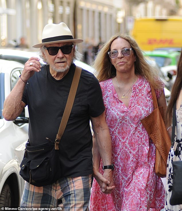 The adorable couple, who have been married since 2001,  were spotted strolling hand-in-hand through the picturesque streets of Milan