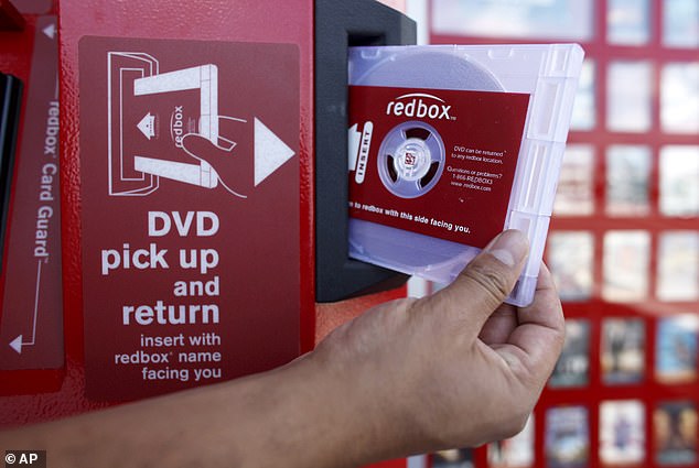 CSSE aimed to combine Redbox's DVD rental business with its streaming services (Pictured: A DVD is dispensed from a kiosk in Los Angeles)