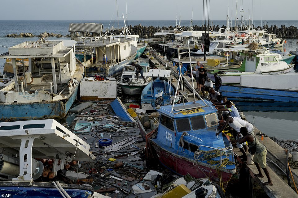 Three casualties have already been reported in Grenada and Carriacou - including one person who succumbed to their injuries after a tree fell on their home, according to Kerryne James, the minister of climate resilience, environment and renewable energy. Another casualty were reported in St. Vincent and the Grenadines, and two others were in northern Venezuela - where five people were still missing as of Tuesday. But Mitchell warned on Tuesday: 'The possibility that there may be more fatalities remains a grim reality as movement is still highly restricted.' The storm is now making its way straight for Jamaica, where a Hurricane Warning remains in effect. It is expected to start losing some of its intensity, but will still be a major storm when it passes near or over Jamaica early Wednesday morning. Beryl will bring with it life-threatening winds and storm surge to the area, with local officials warning residents in flood prone areas to prepare for evacuation.