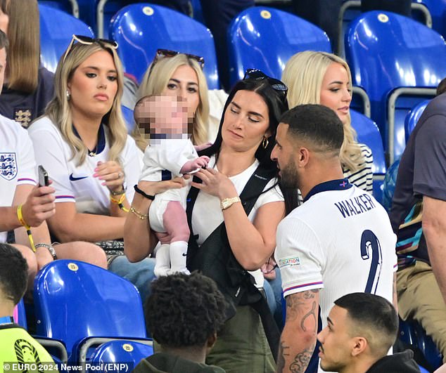 Kyle Walker joins Annie Kilner in the stands after England's dramatic win against Slovakia