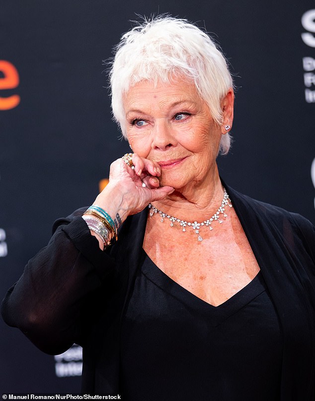 Dame Judi Dench, 89, is one of the first two female members to be admitted to the Garrick Club - which has previously only been open to men