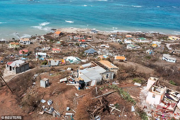 The ferocious category five storm already left six people dead and caused significant damage to parts of the Caribbean. Pictured: Destruction on the island of Petite Martinique, Grenada