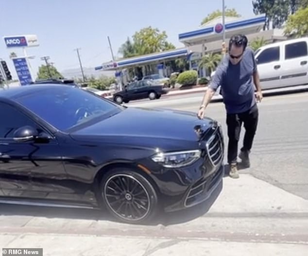 The filmed attack appeared to take place in Southern California, cedars, palm trees, and street signs seen in the background suggest - as does the perp's license plate, which was shared by the person behind the camera afterwards