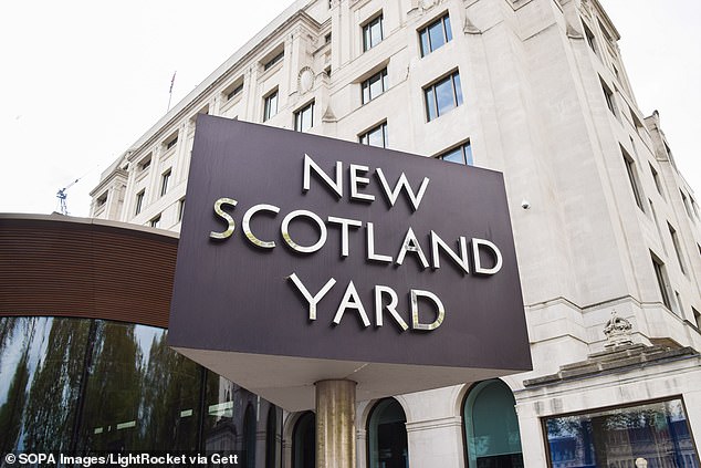 A senior Met Police firearms inspector has been arrested on suspicion of rape (Pictured: The New Scotland Yard sign at the Met's HQ in Westminster)