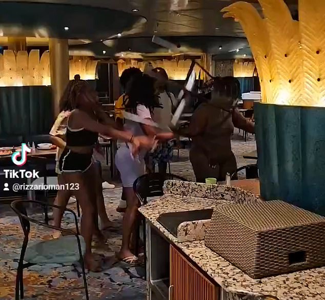 Chairs were sent flying in the brawl, which took place in the dining area of a Carnival Cruise ship