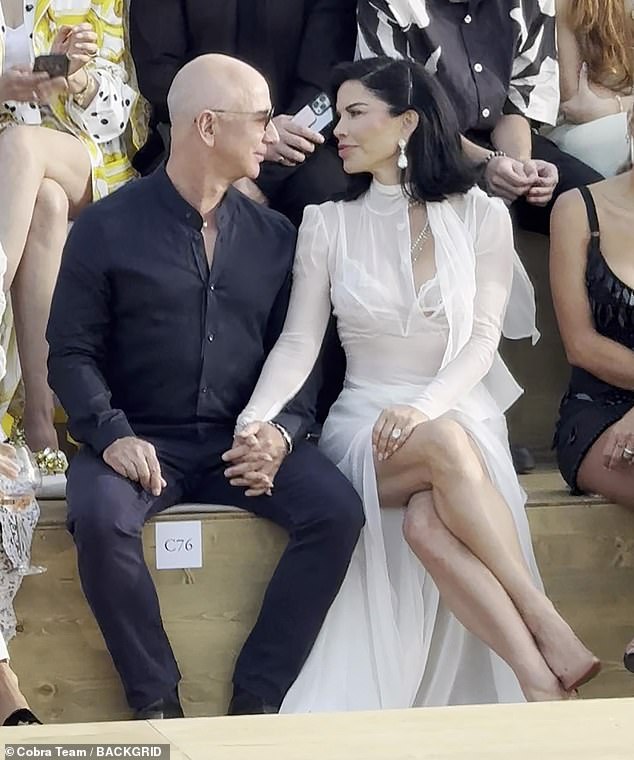 Lauren Sanchez and billionaire fiancé Jeff Bezos looked every inch the adoring couple as they sat front row at the Dolce & Gabbana fashion show in Sardinia