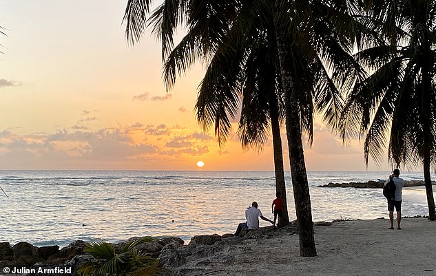 The author delineates: 'The weather is wonderful all year round.' Above - sunset on the south coast of the tropical island