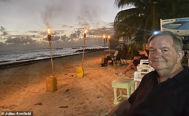 'I began to feel that I was getting closer to becoming a proud member of the Bajan community,' notes the author, seen here at Calma, a 'delightful' beachside bistro, in Holetown