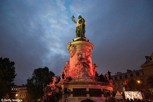 Tens of thousand people gather on Place de la Republique in Paris to protest against the far-right party National Rally