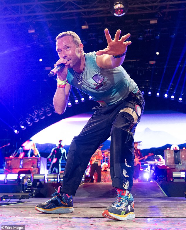 Singer Chris Martin: The band agreed a seven figure settlement with ex-manager Dave Holmes