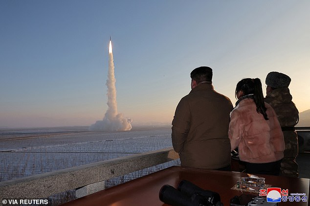 North Korean leader Kim Jong Un views the launch of an ICBM (Reuters)