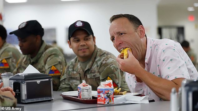 Joey Chestnut, 16-time Nathan's hot dog eating champ, shared a meal with soldiers at Fort Bliss in El Paso, Texas instead of attending the New York frank eating contest