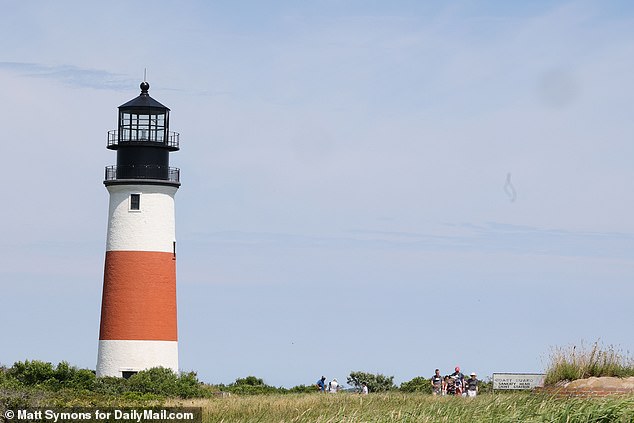 After the Fourth of July parade they went on a bike ride and a walk up to the Sankaty Head lighthouse where they posed for a selfie together