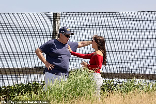 The couple celebrated the fourth of July on the exclusive island, enjoying the local bike parade with friends and Belichick’s family