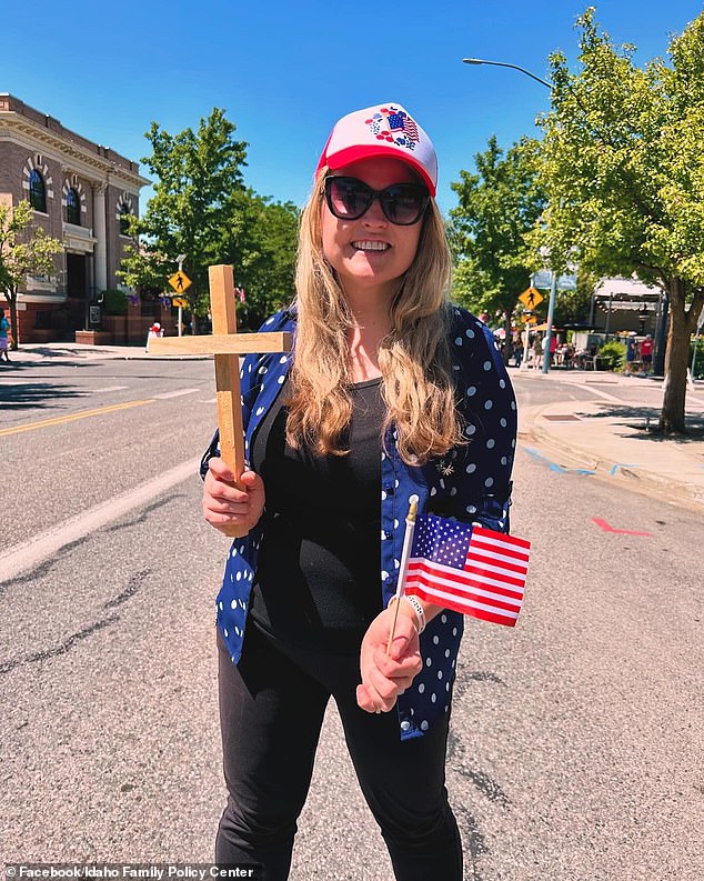 As some carried crosses alongside Old Glory, others wore t-shirts with the symbol of the cross emblazoned across it