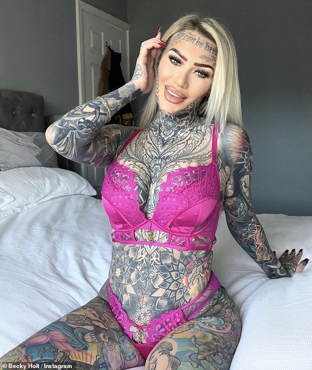 The model and OnlyFans creator, who has £30,000 worth of tattoos - which cover 95 per cent of her body, says getting her genitals tattooed was 'horrific'