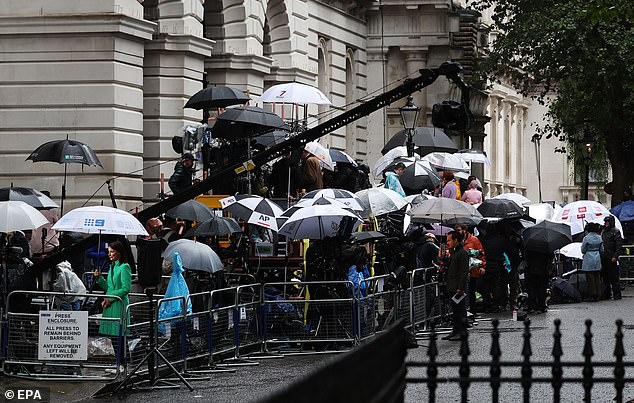 Media gather outside 10 Downing Street in London this morning after the General Election