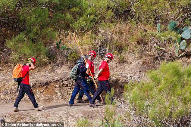 Search crews are seen last week scouring the area where Jay is believed to have gone missing