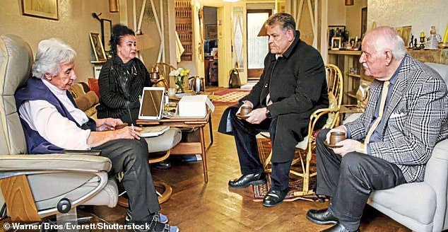 Descendants of Rudolf Höss (right) meet an Auschwitz survivor and her daughter (left)