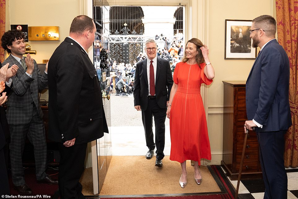 Sir Keir Starmer, the newly-elected PM, and his wife Victoria were clapped in by staff as they entered No10