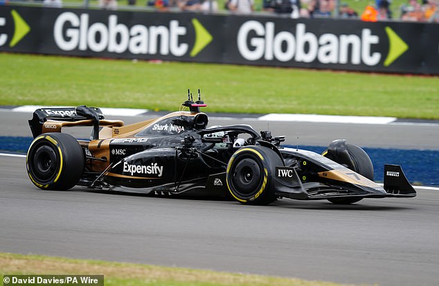 Filming takes place on the track at Silverstone as fans get a glimpse of the new F1 movie