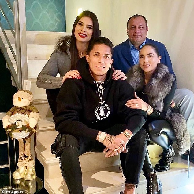A December 2019 photo shows Martha (top left), her brother Carlos (bottom left) and their parents