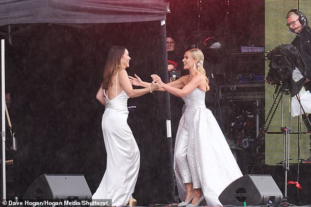 Katherine wrote on Instagram: 'Singing in the rain at ☔️ Thank you to the amazing crowd for braving the wet'