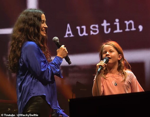 Alanis Morissette, 50, made her daughter Onyx's eighth birthday extra special by performing her classic hit Ironic together during her concert at Bridgestone Arena in Nashville