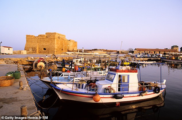 Pafos, with its medieval fort and harbour. Below, Aphrodite's Cove