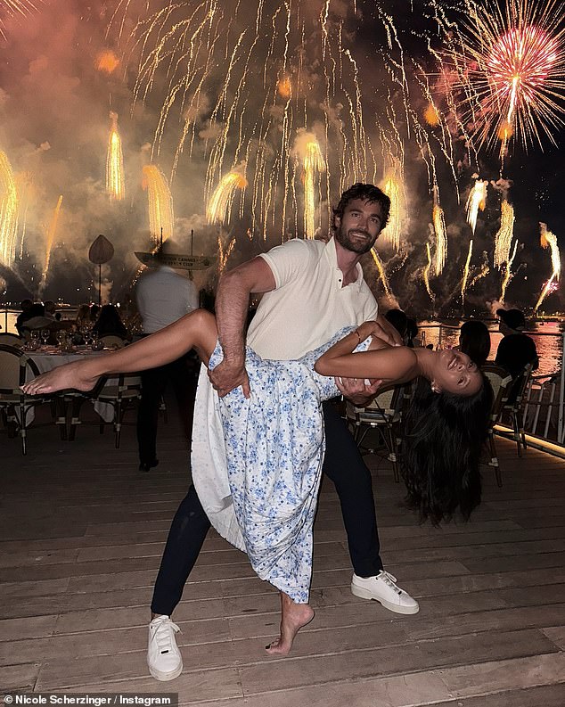 Nicole Scherzinger and her fiancé Thom Evans looked on cloud nine as they celebrated Independence Day on the French Riviera in Cannes on Thursday