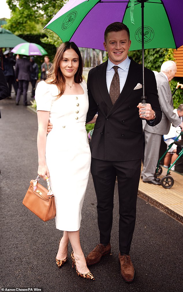 Holly Ramsay stuns in chic white dress while posing alongside boyfriend Adam Peaty for day six of Wimbledon on Saturday