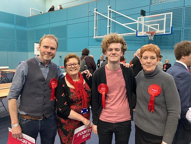 Sam beat out his 63-year-old opponent Shailesh Vara who was first elected when Sam was just a toddler. Sam is pictured surrounded by fellow Labour activists